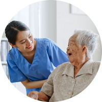 Caregiver supporting and elderly lady