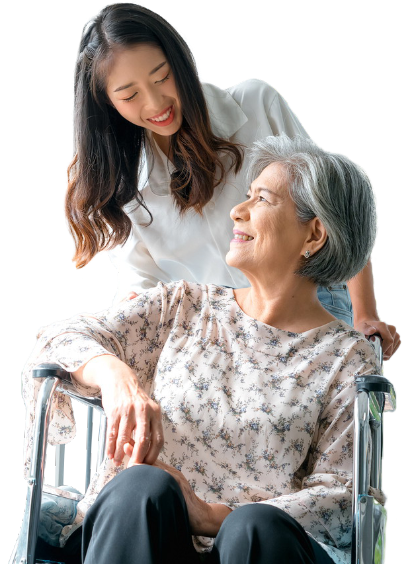 Young Person pushing a wheelchair bound person