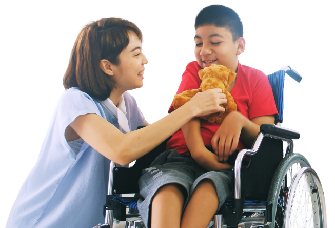 Nurse playing with a kid that is in a wheelchair