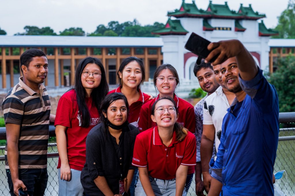 a group of people posing for a photo