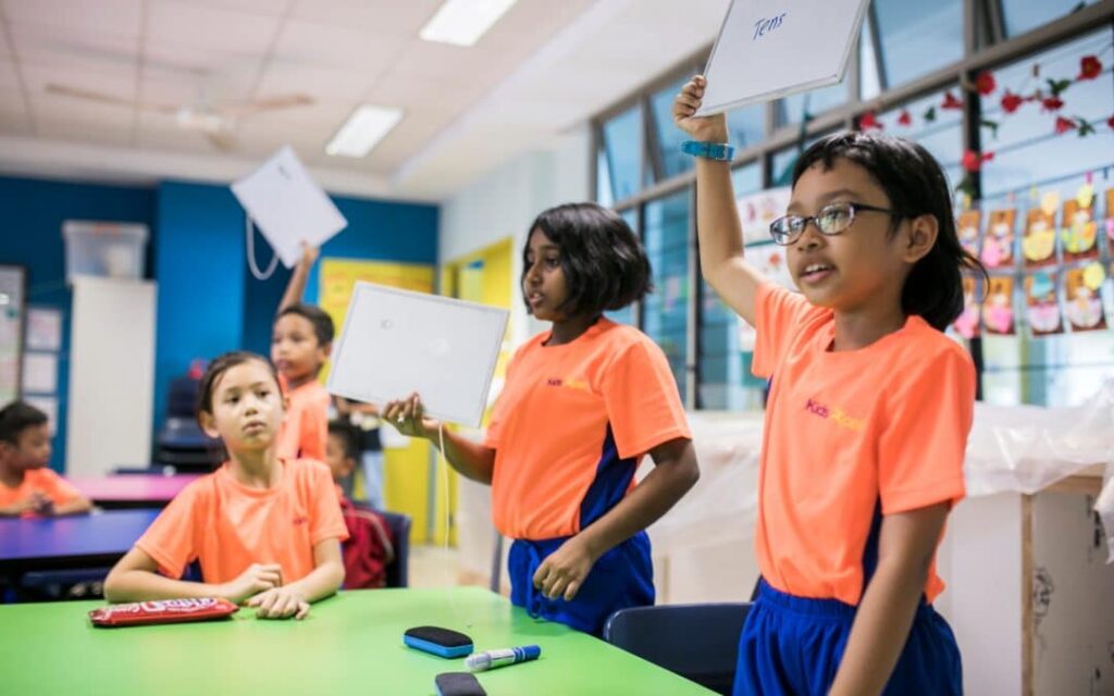 a group of children in a classroom