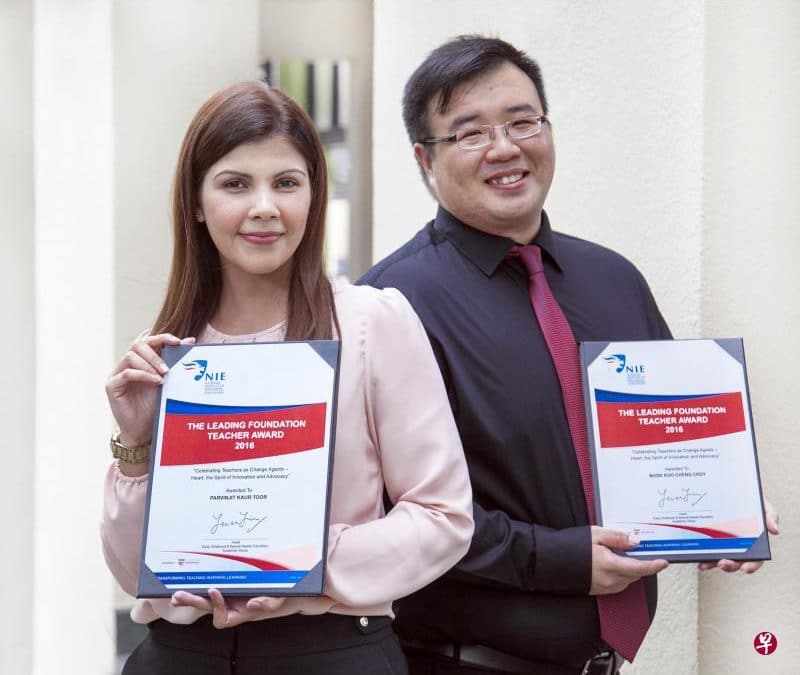 a picture of two teachers holding The Leading Foundation Teacher Award