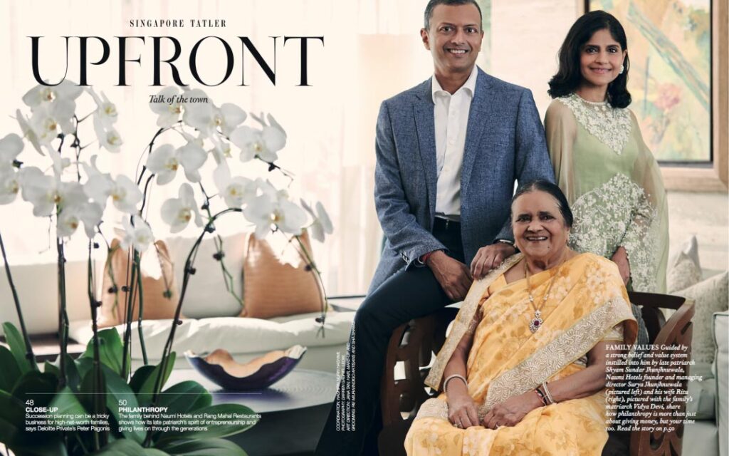 Family relaxing on couch, on a magazine. (Singapore Tatler Upfront)