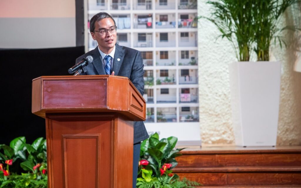 Chairman Laurence Lien Speaking in front of the stage